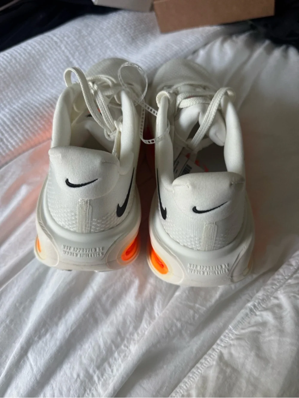 Nike White Athletic Shoes with Black Swoosh and Orange Accent Men 5.5/Women 7